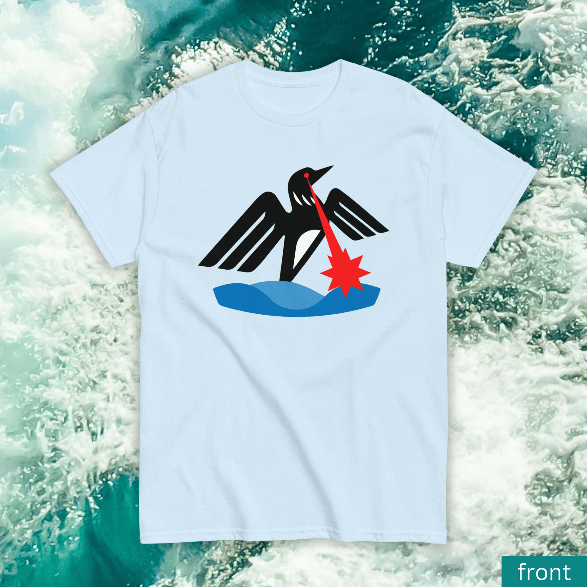 The shirt features the viral Minnesota Laser Loon which first appeared when Minnesota accepted new state flag designs . The loon from the state seal is shown with broad wings and shooting a laser beam from its eyes into the water. The T-shirt is a light and bright blue and is shown above rippling water as a background.